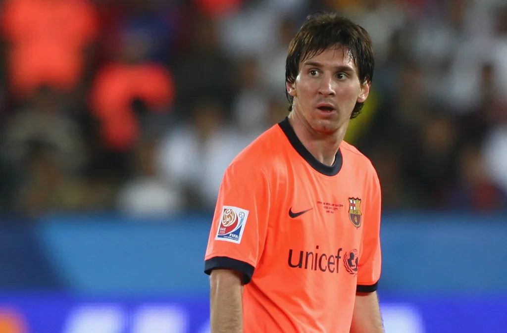 12. FC Barcelona Away 2014-15 – Neon Orange Treble Kit